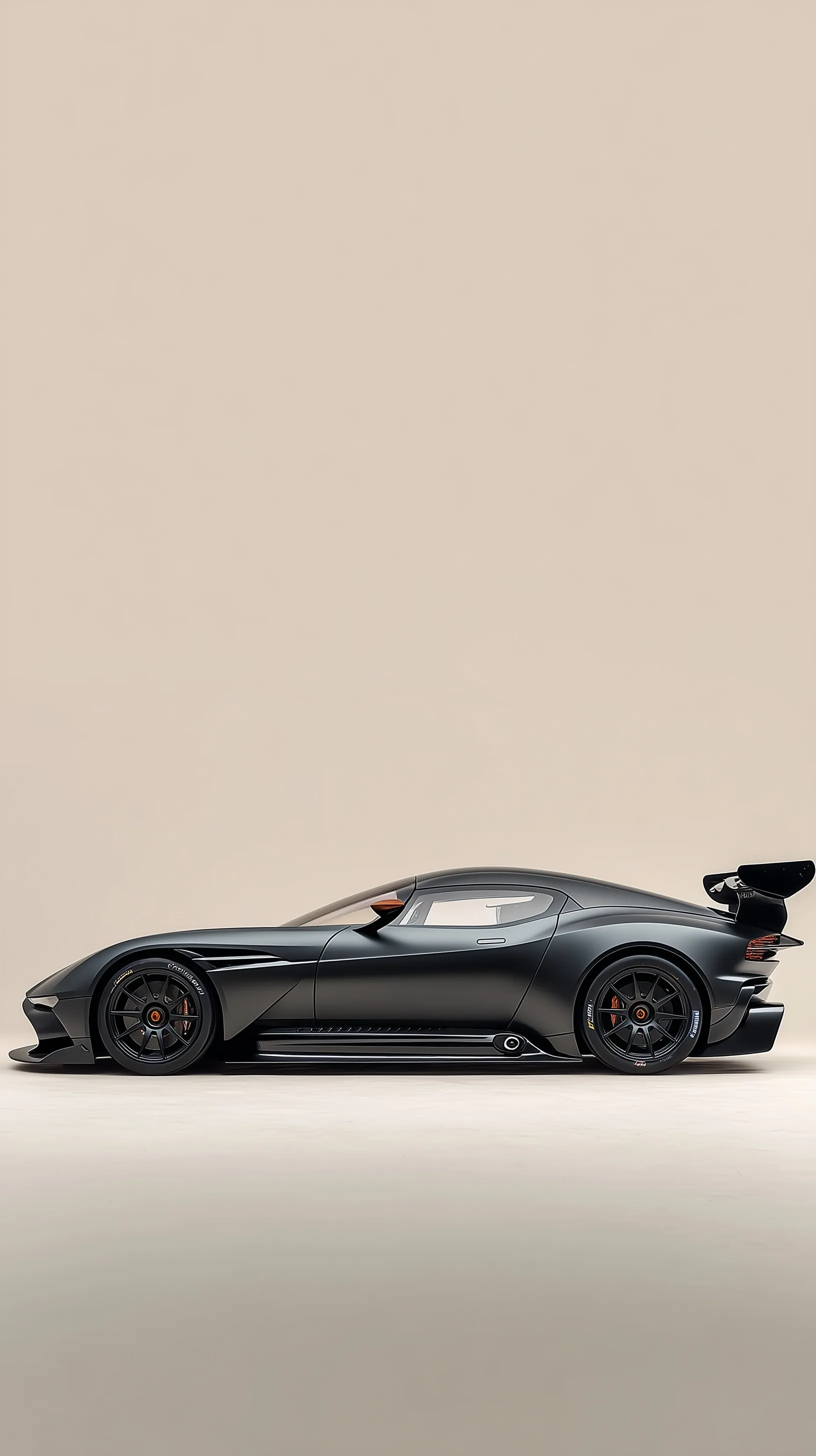 Matte black Aston Martin Vulcan side view on a soft off-white background, perfect for a high-quality phone wallpaper.