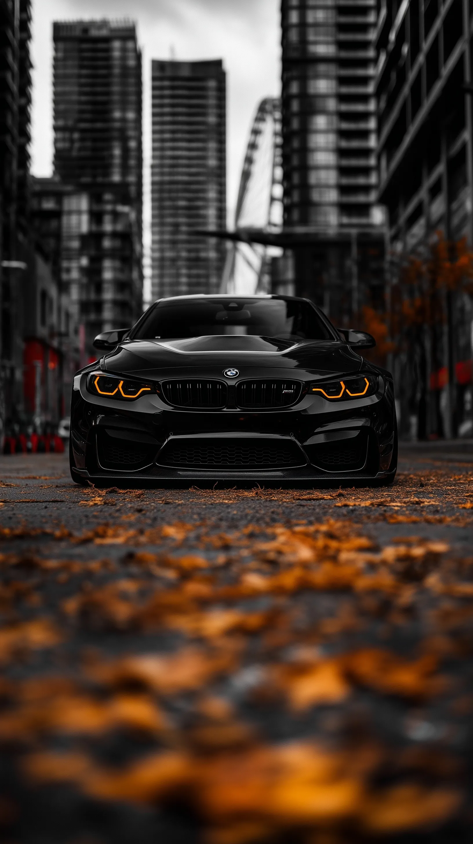 Modified BMW M4 Competition in glossy black parked on an abandoned city street, cinematic 9:16 vertical wallpaper.