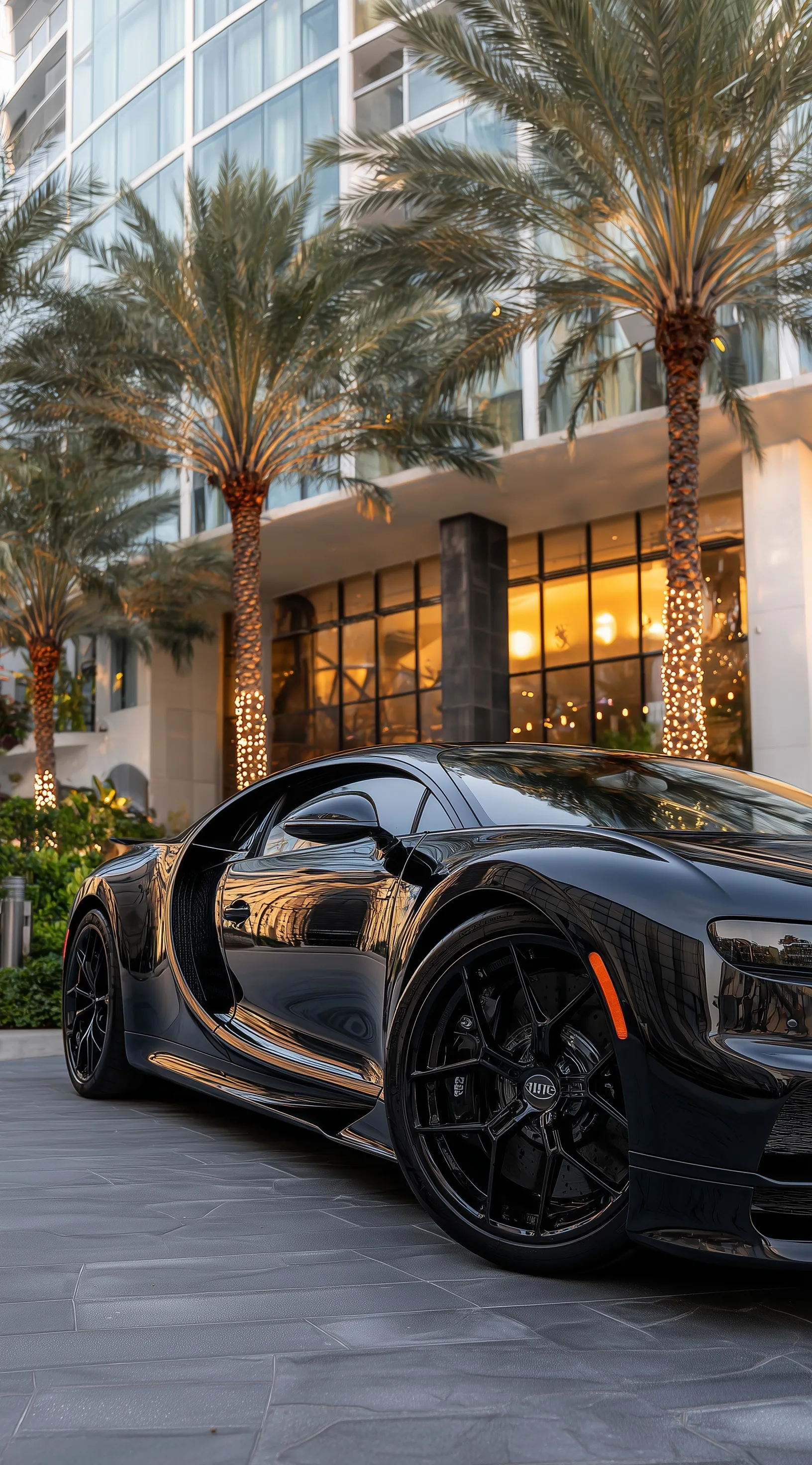 A sleek black Bugatti Chiron parked at a Miami hotel, low-angle rear view with palm trees, high-resolution aesthetic.