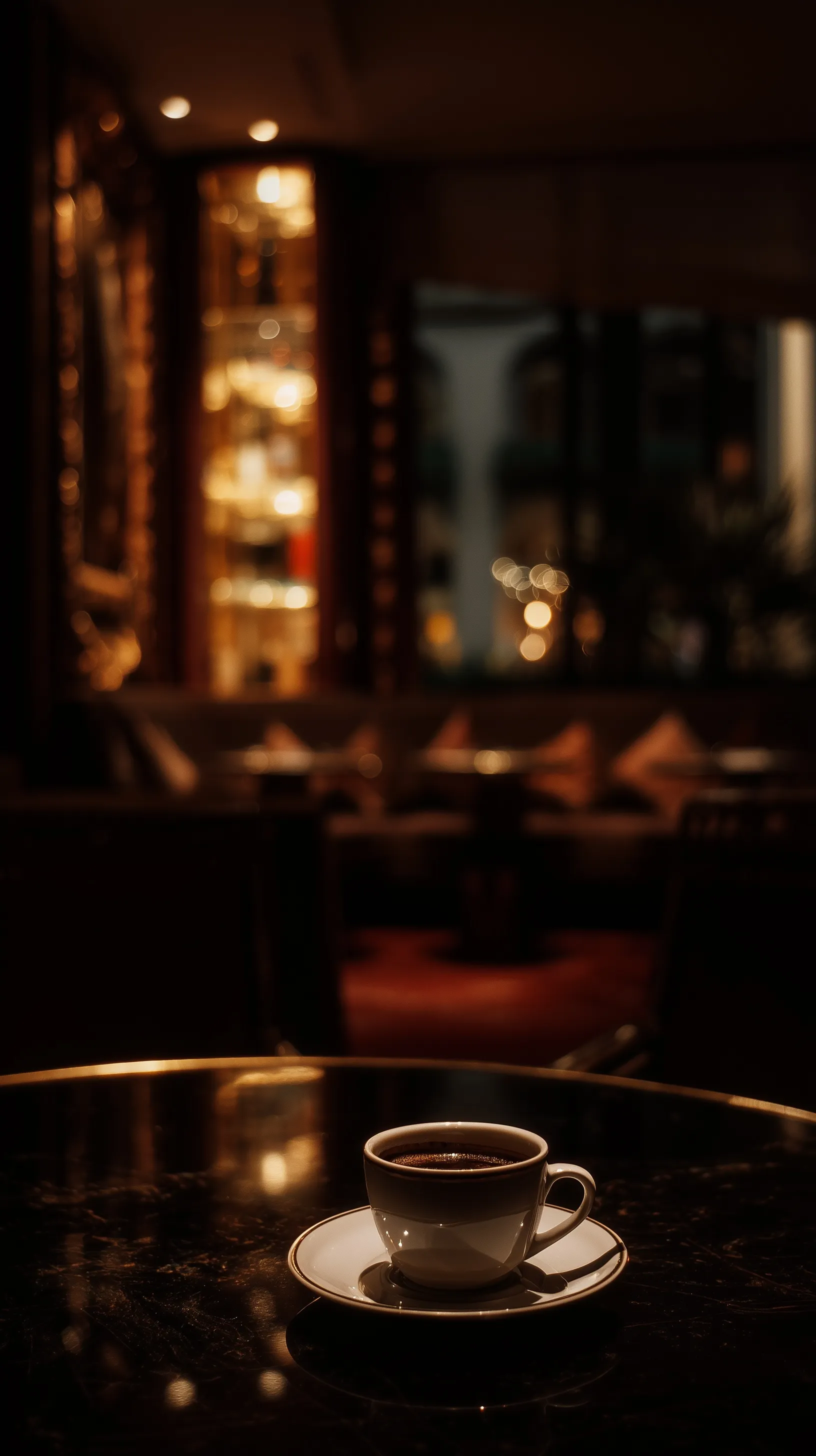 A cinematic shot of night coffee in a luxurious venue, captured with a Leica M6 and 28mm lens.