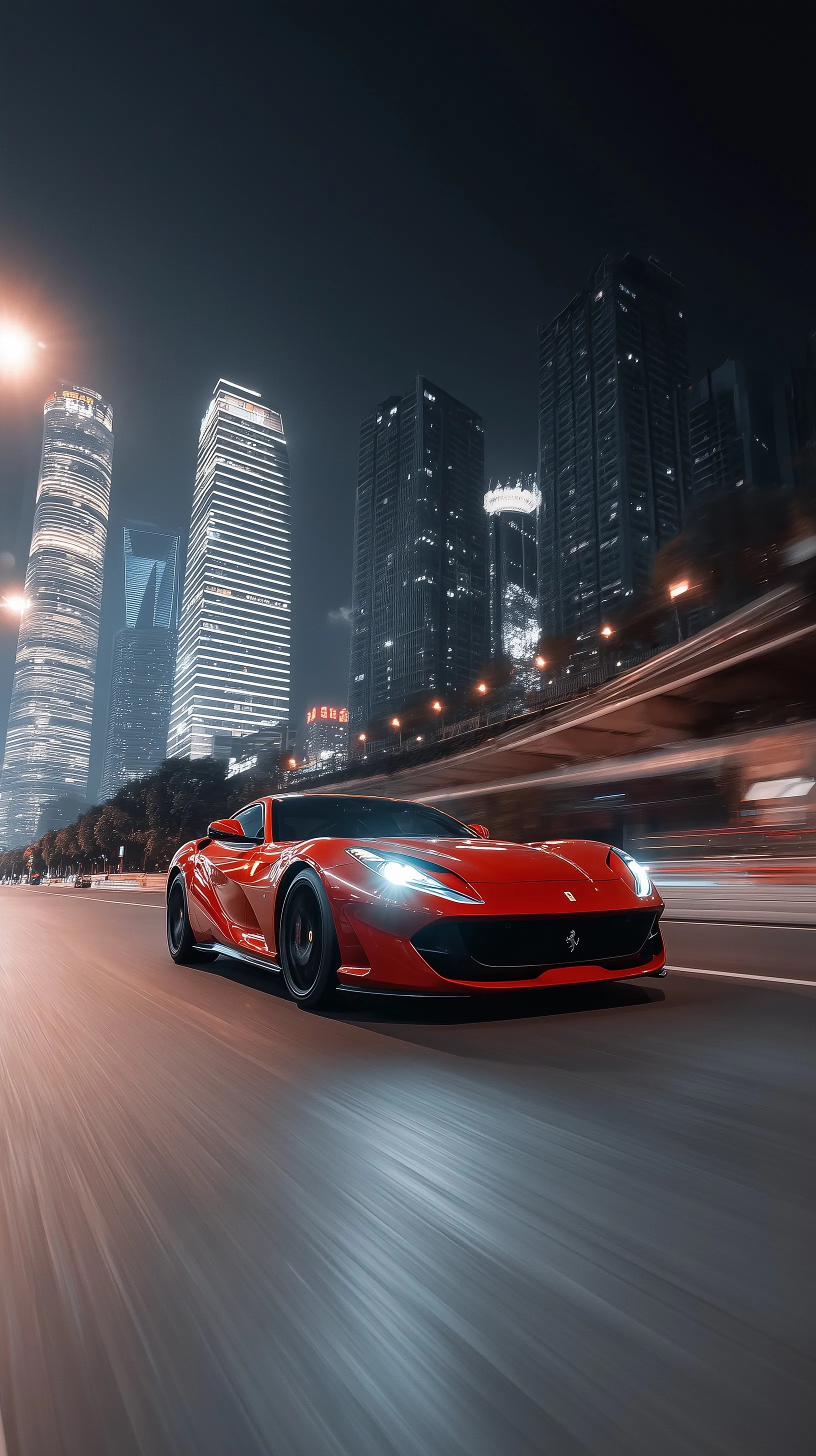 A sleek red Ferrari speeding on a city highway against a blurred, vibrant urban night skyline.