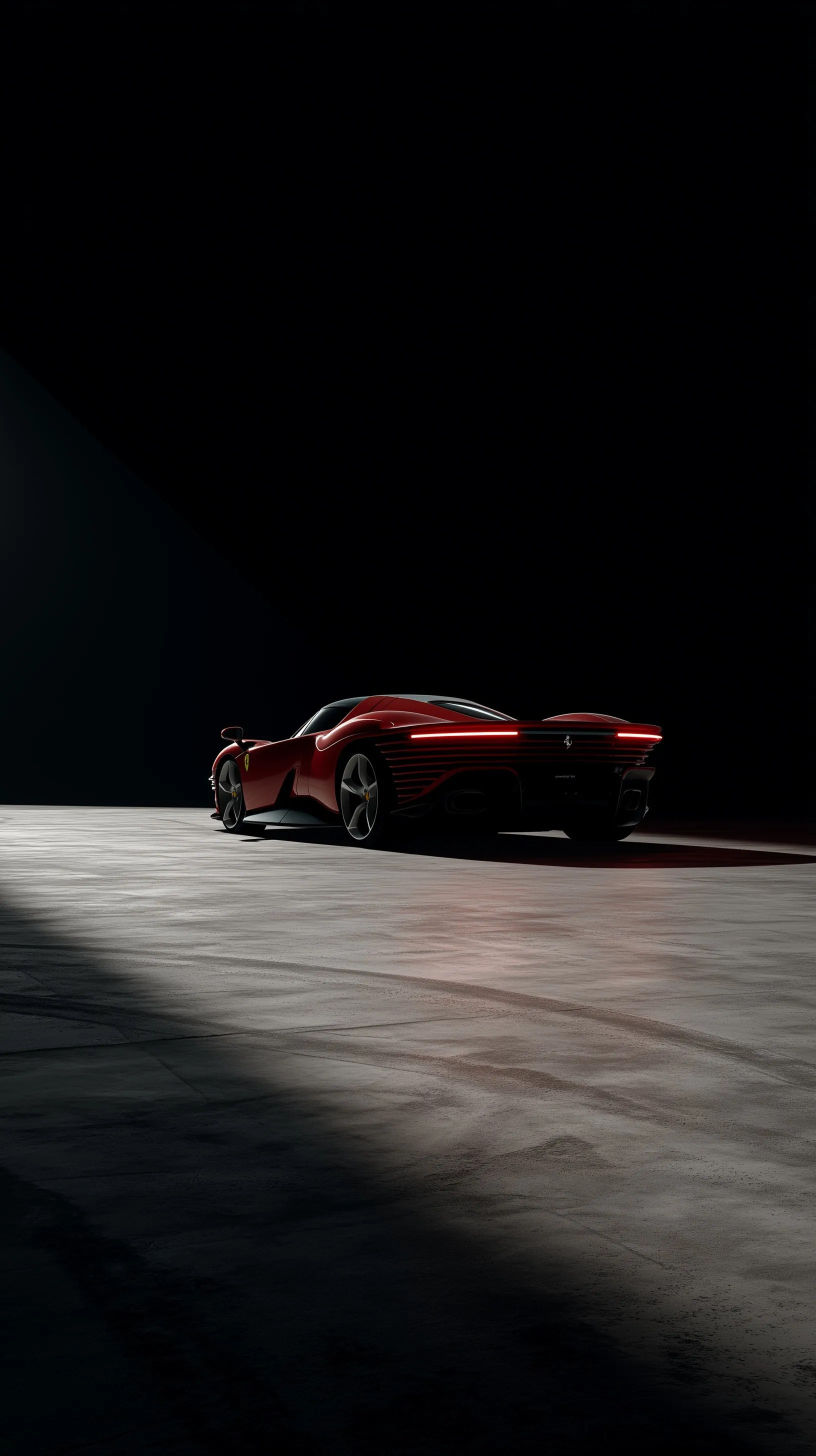 Red Ferrari Daytona SP3 drifting in a dark industrial space, captured in high-contrast cinematic motion.