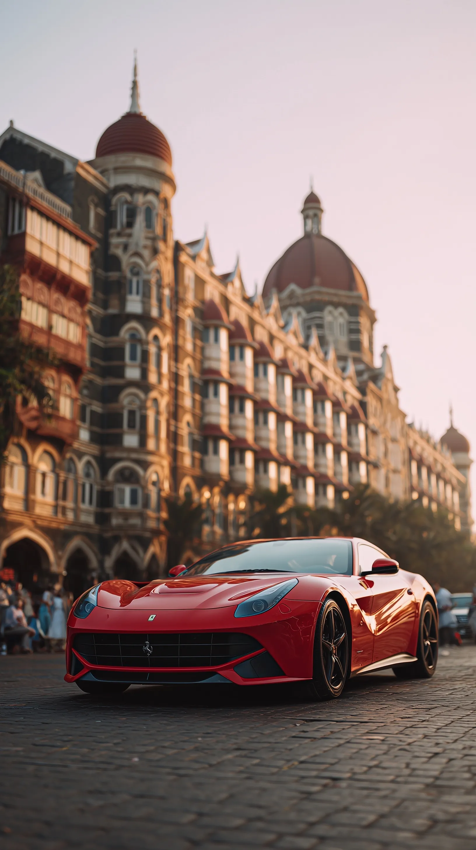 A sleek Ferrari driving on a Mumbai street with the Taj Lands End palace in the background, 35mm bokeh photography.