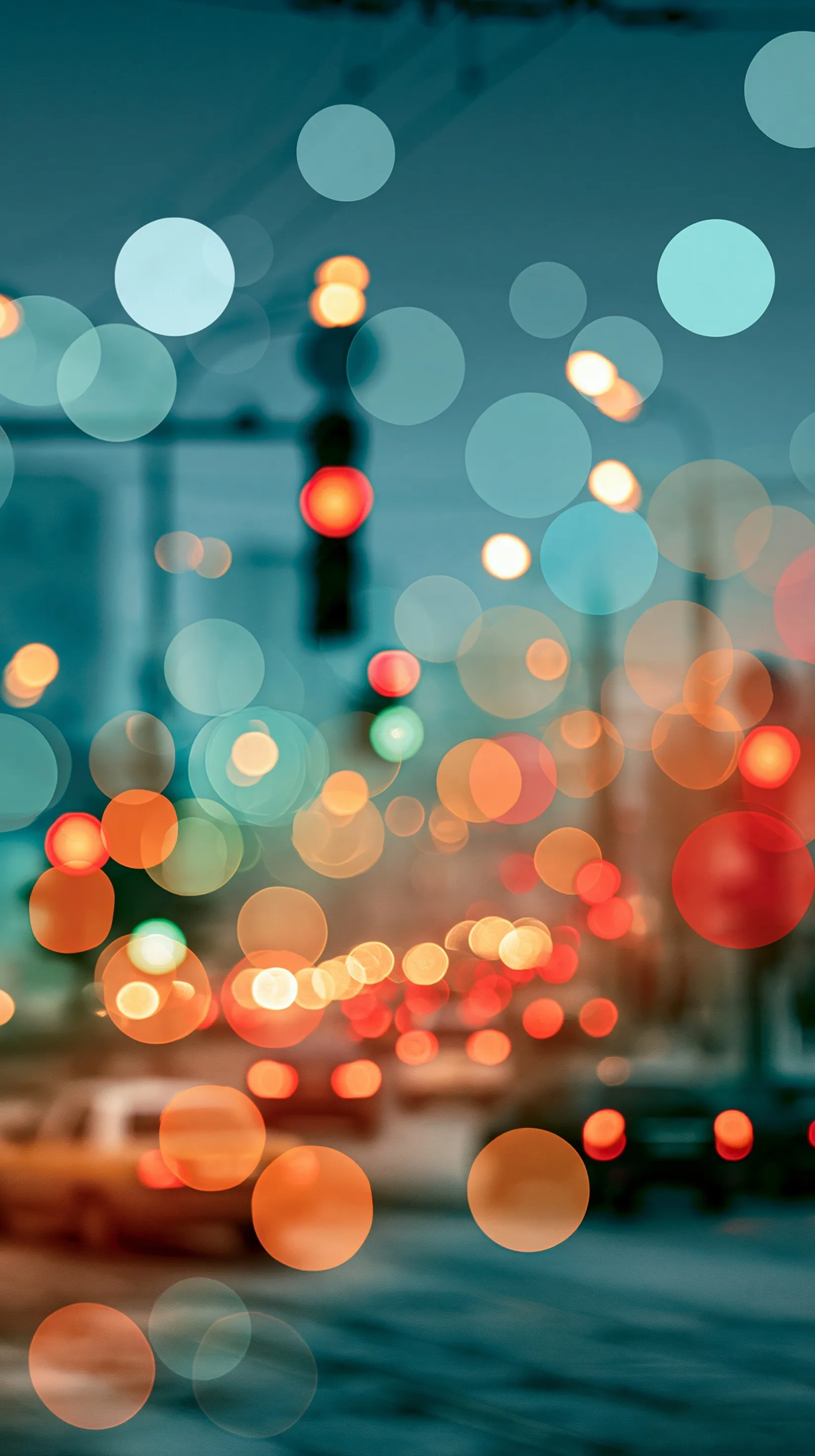 Dreamy blurred city street background at dusk with soft bokeh city lights for iPhone Air.