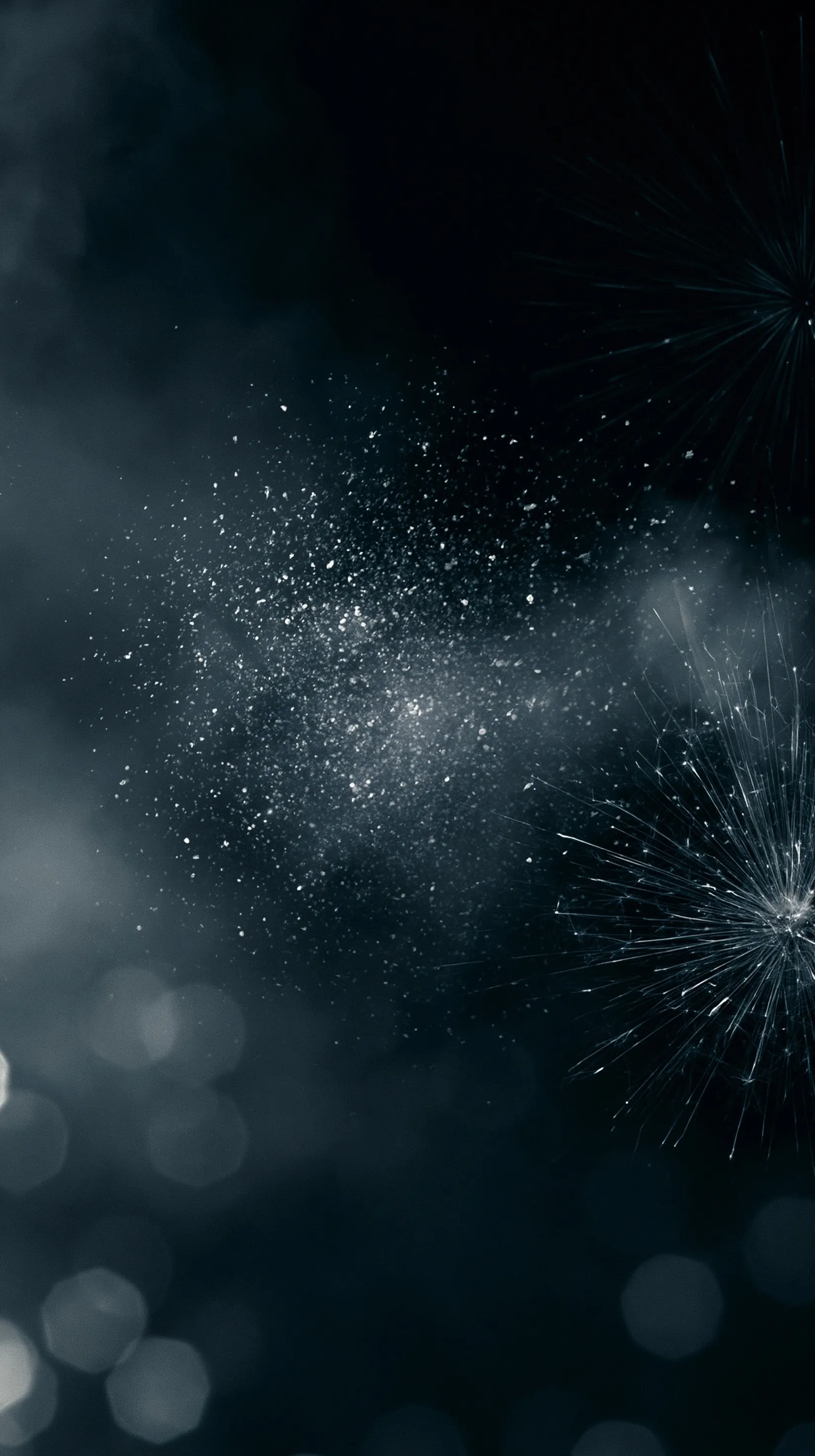 Dark iPhone Air background with elegant silver fireworks, soft bokeh lights, and atmospheric navy haze.