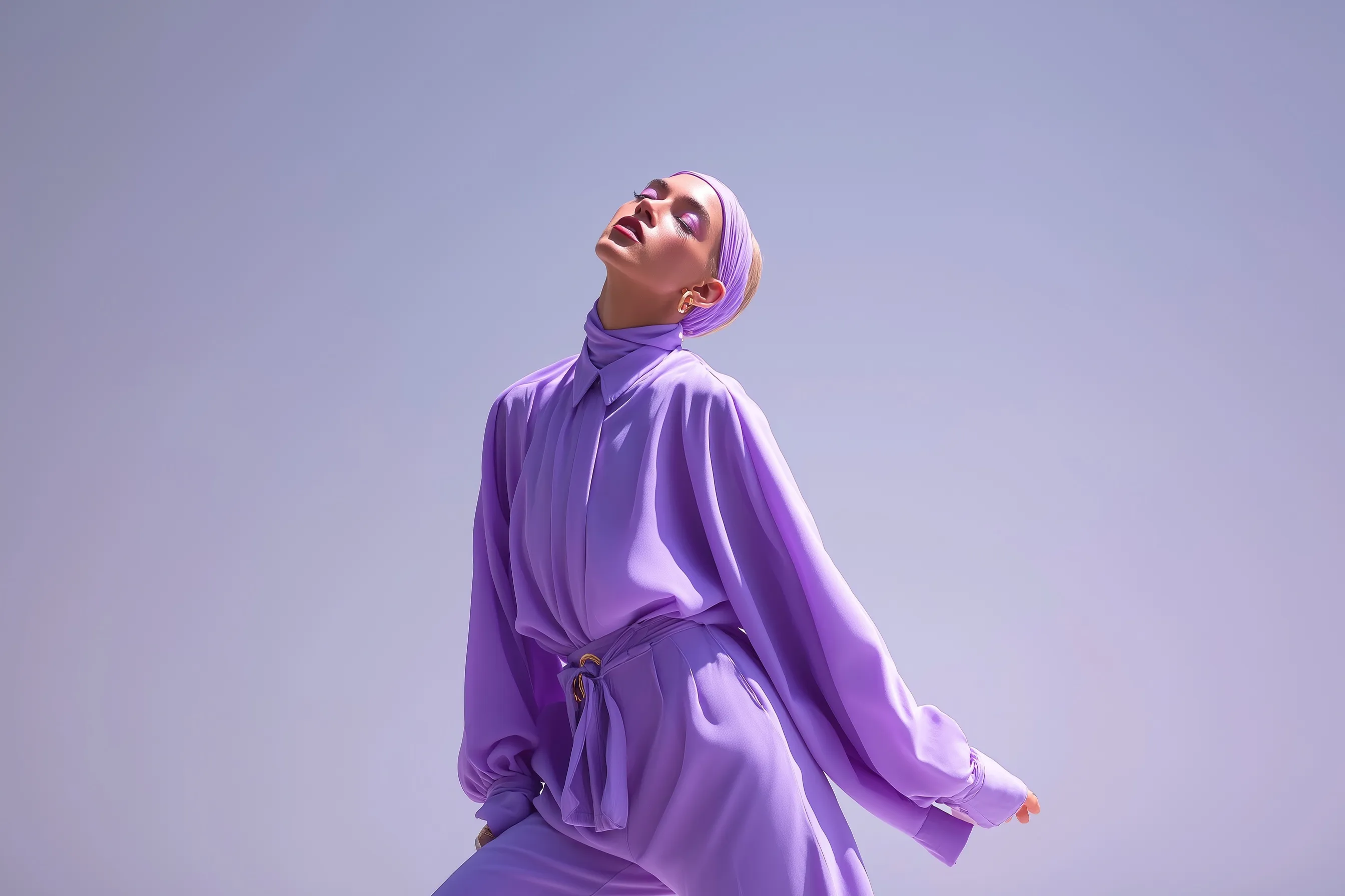 A professional fashion model wearing a minimalist lavender co-ord set in a creative, vogue-style studio pose.