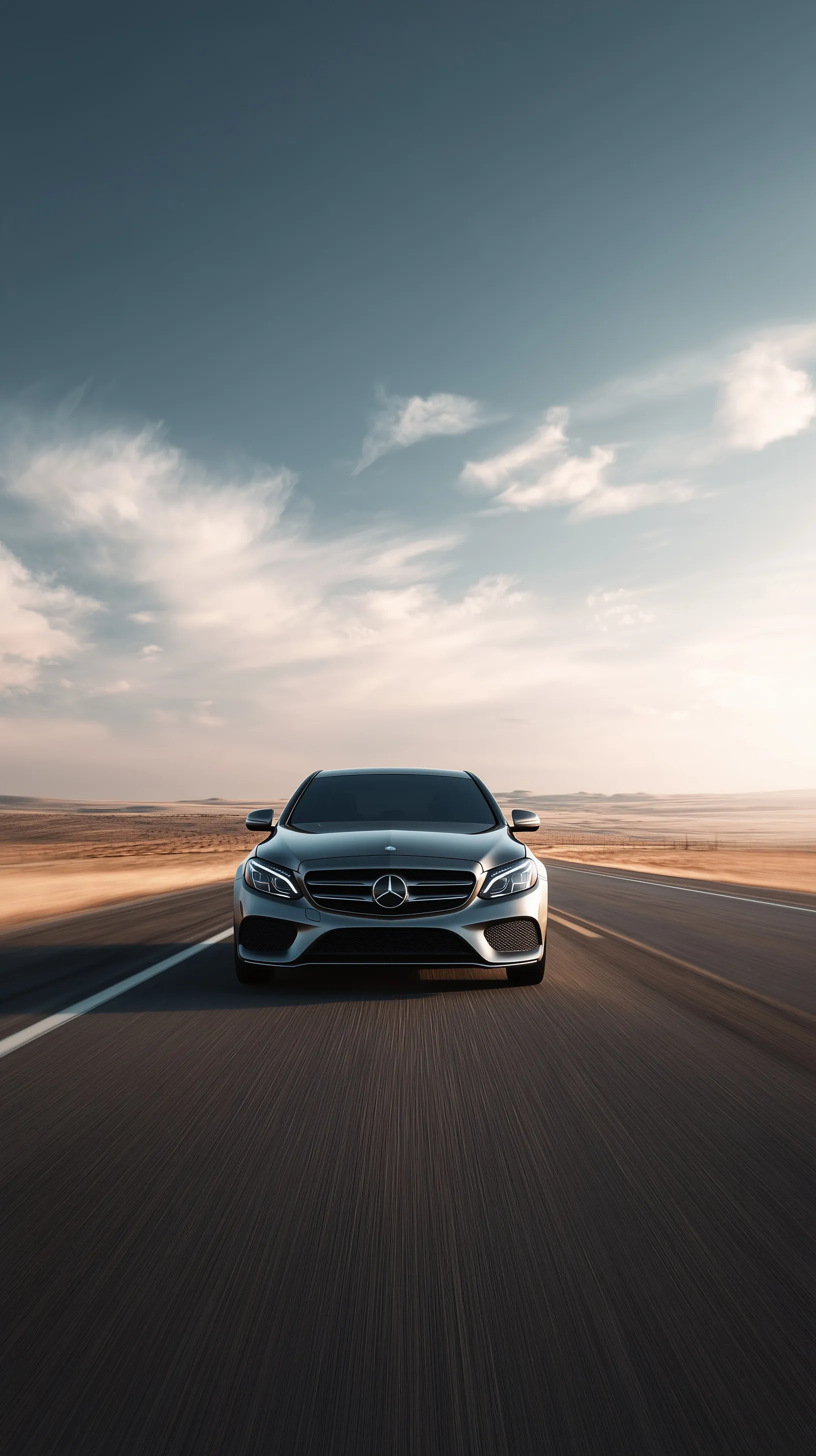 A sleek modern midsize sedan driving on an open highway, photorealistic automotive wallpaper for iPhone.