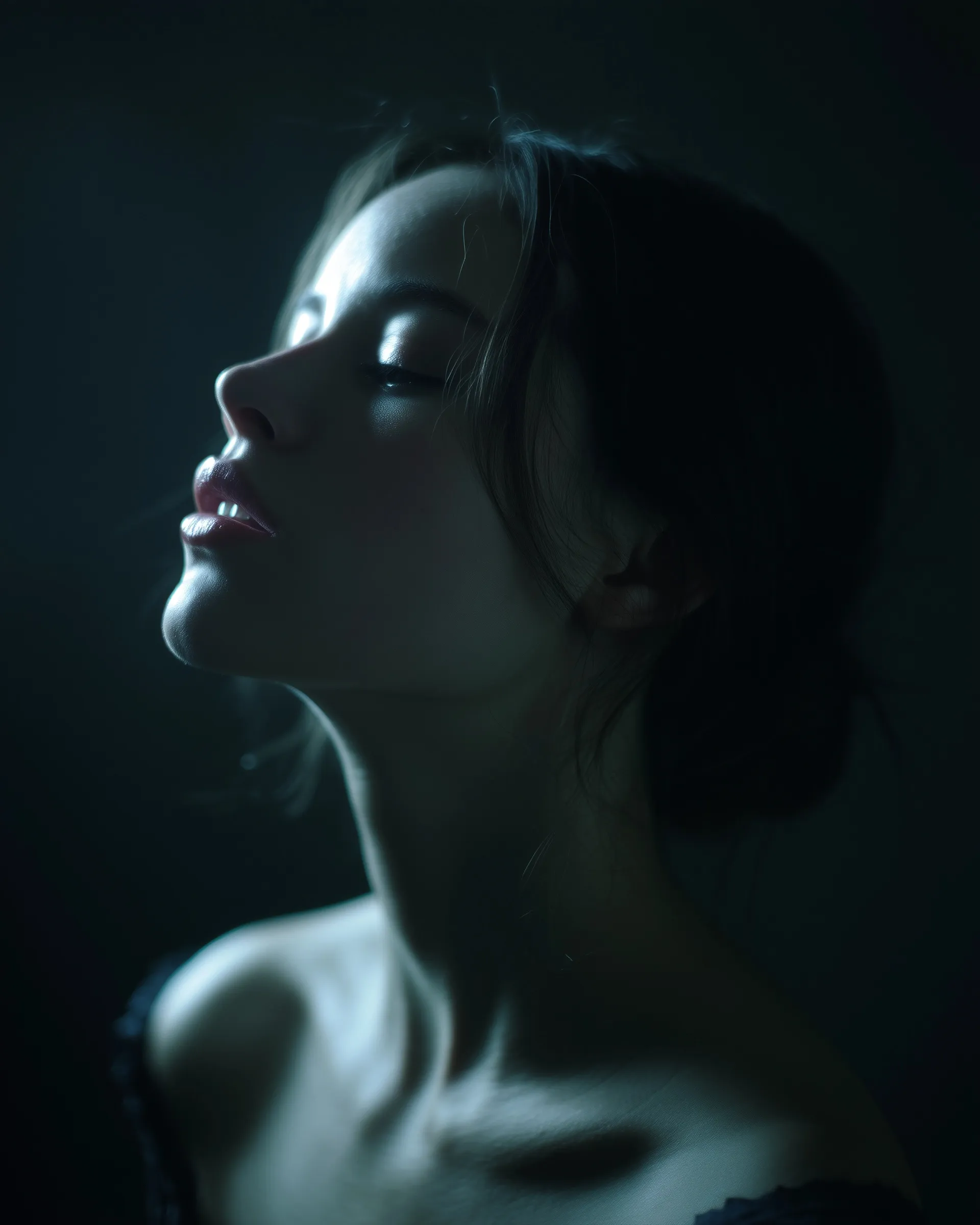 A classic portrait featuring soft chiaroscuro lighting on porcelain skin with sculptural, high-contrast features.