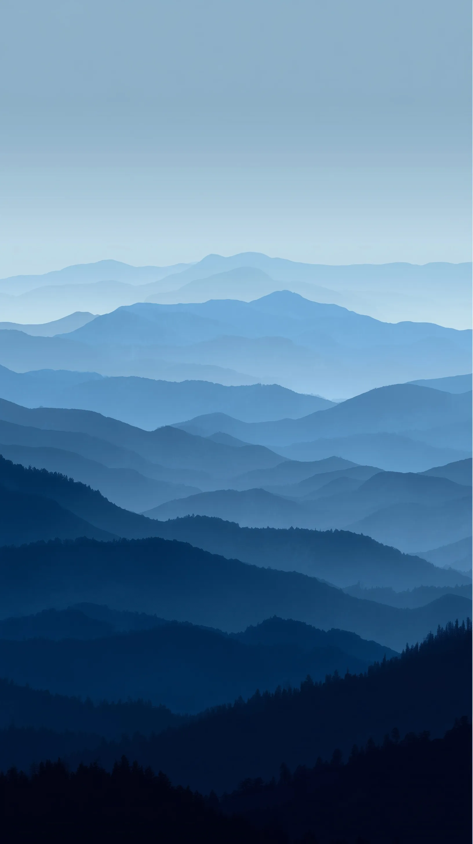 Minimalist smoky mountain range wallpaper in shades of misty blue and midnight blue for iPhone 17 Pro Max.