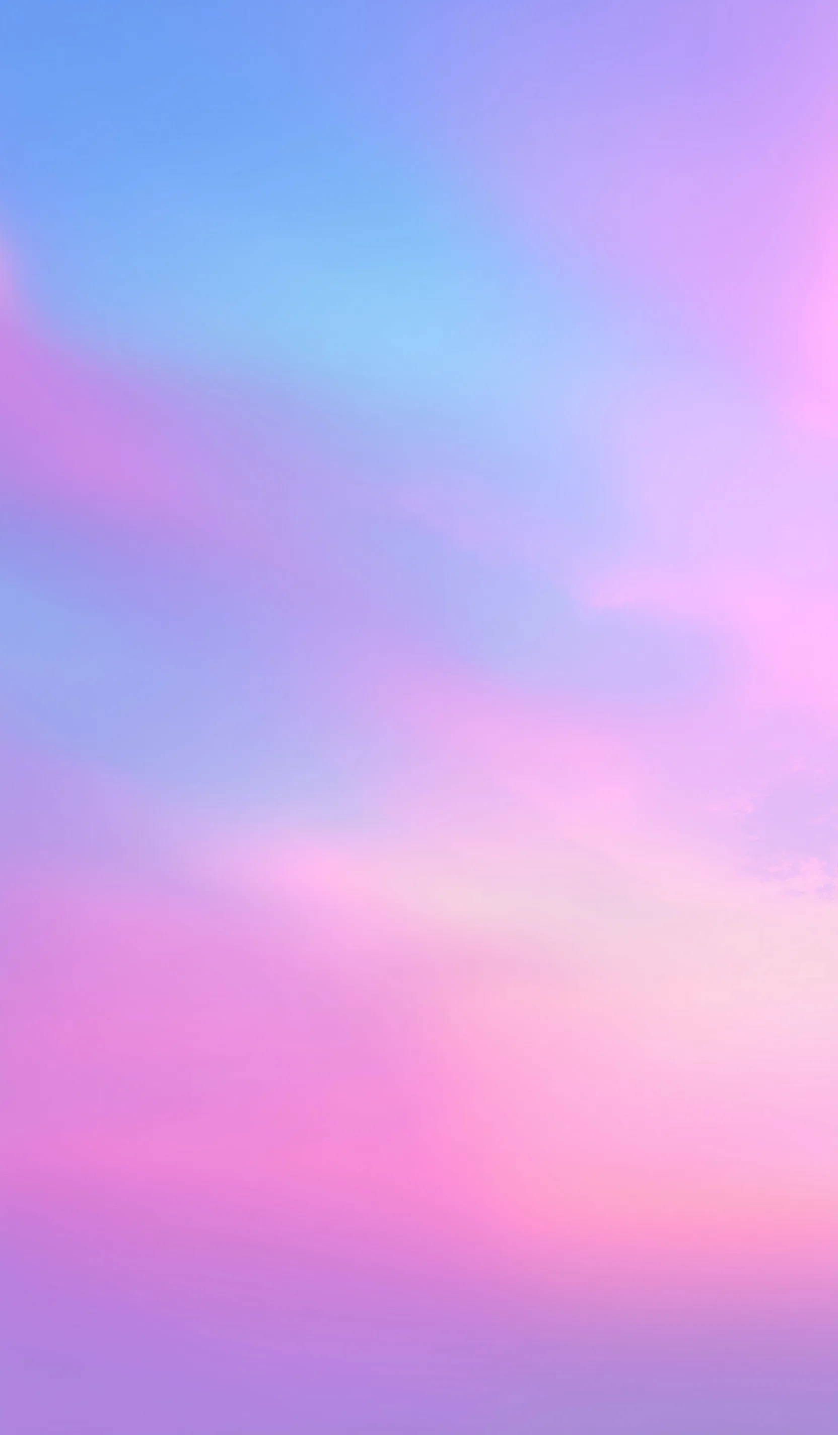 Soft pastel pink and baby blue blurry gradient background for minimalist smartphone wallpaper.