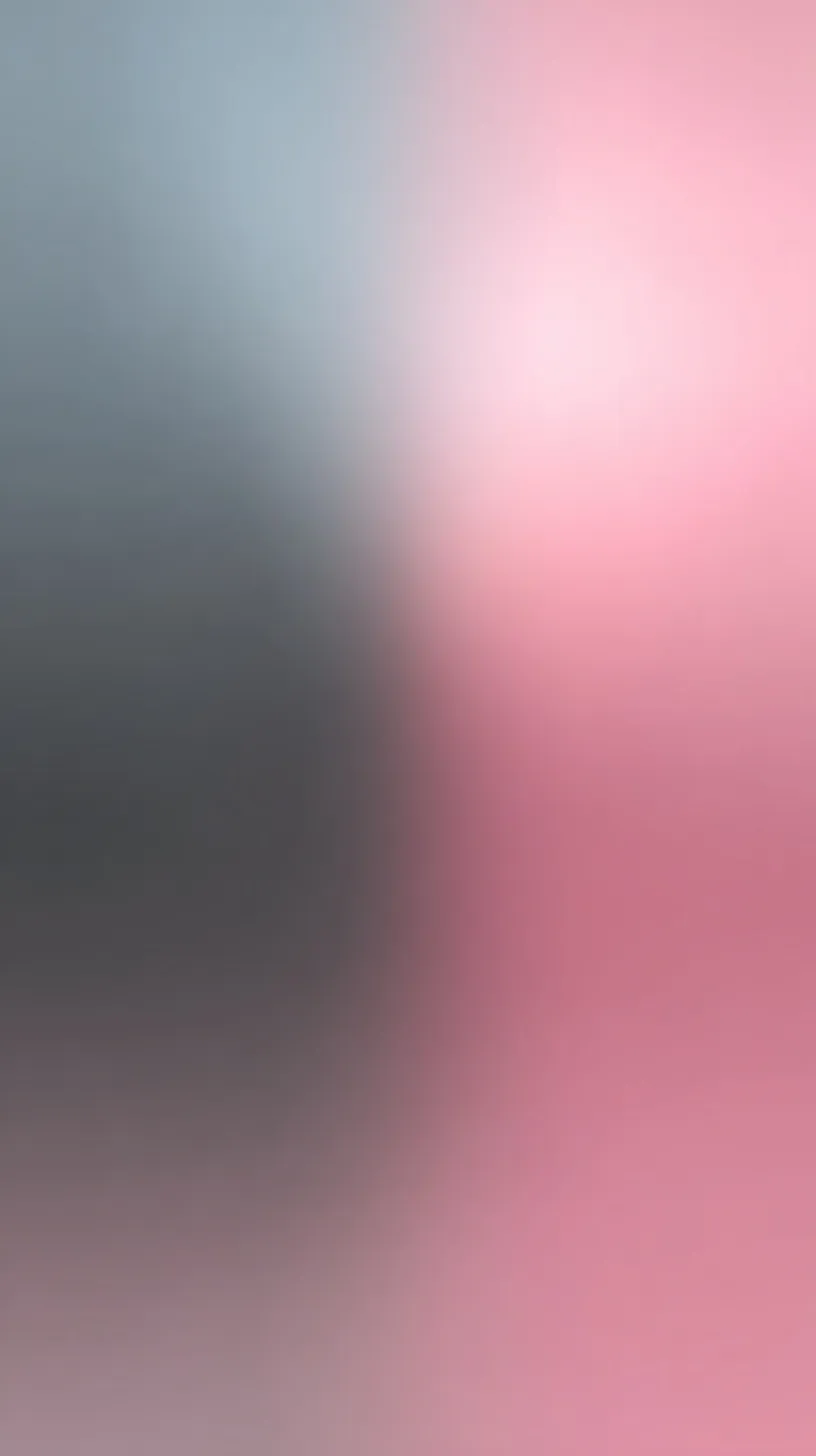 Smooth pastel pink and gray blurry gradient background with a soft, minimalist light flare and modern aesthetic.