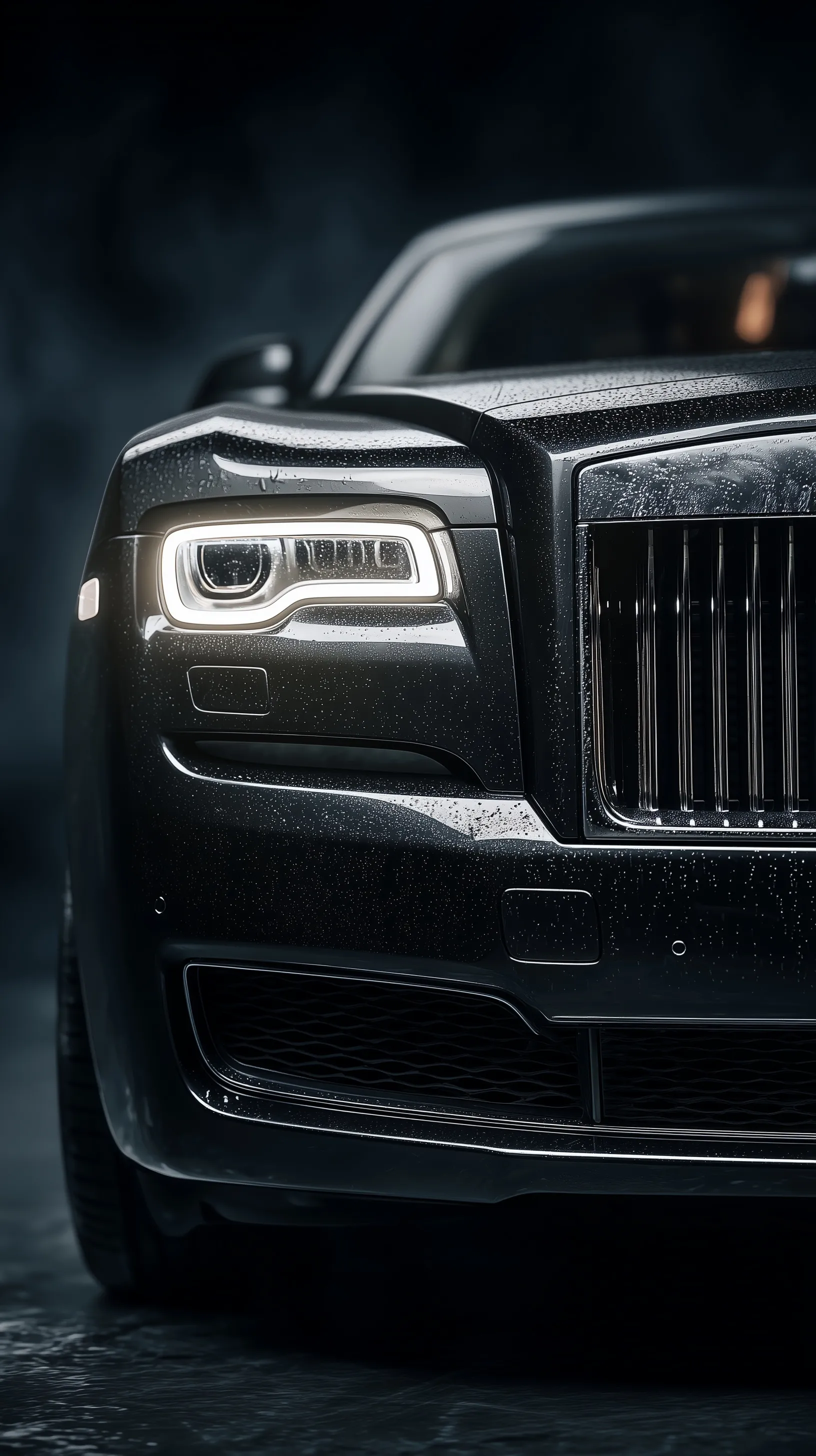 Studio-lit front view of a luxury Rolls-Royce against a black seamless backdrop, hyper-realistic iPhone wallpaper.