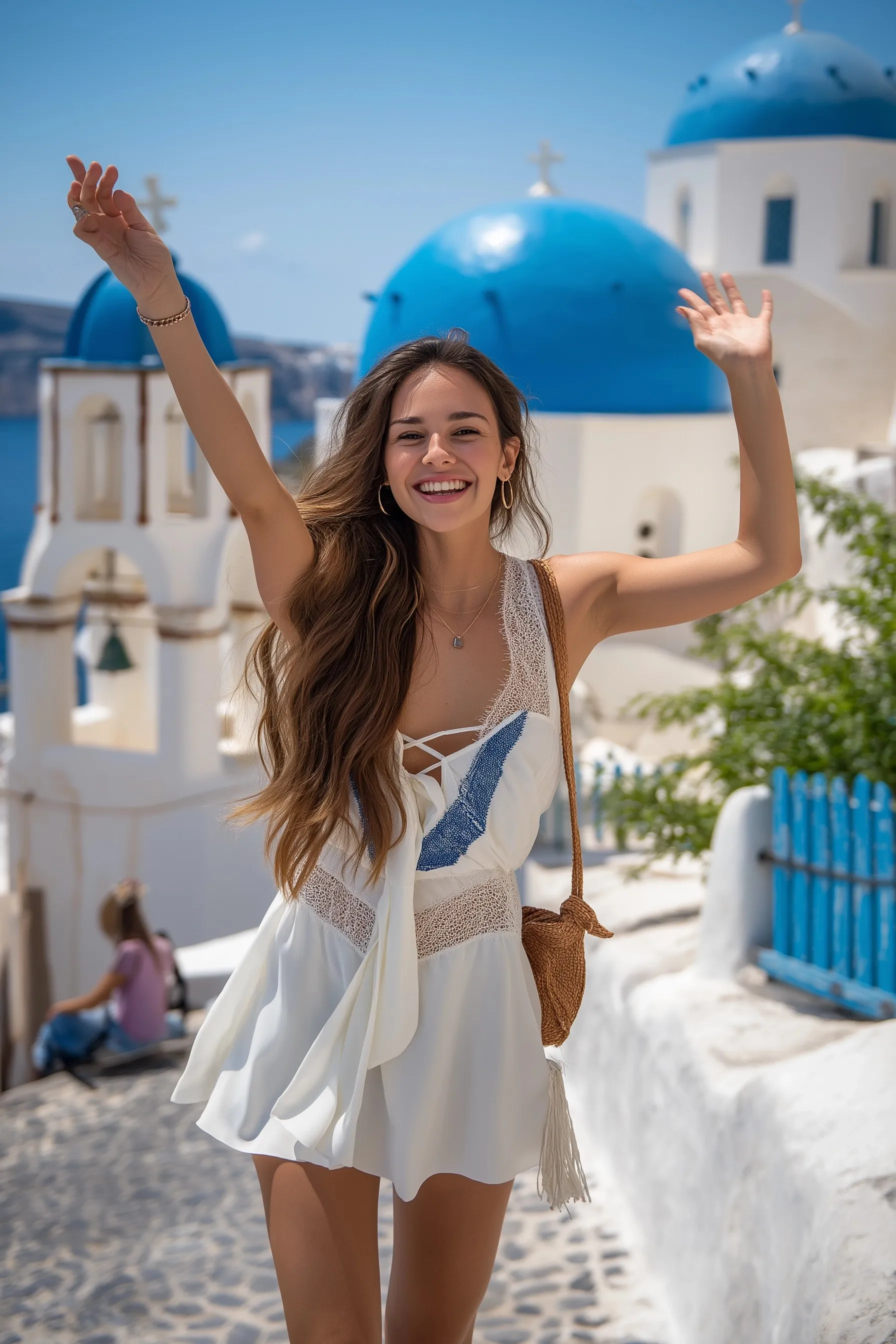 A beautiful 25-year-old female influencer wearing a summer outfit while vacationing in Santorini, Greece.