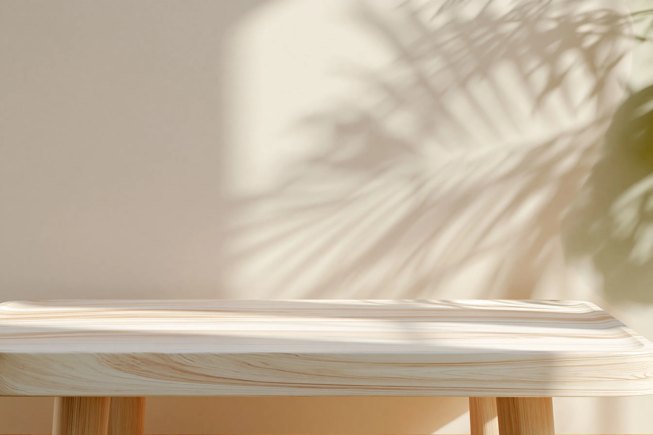 Minimalist light wood console table surface with soft shadows and neutral boho background for product mockup.