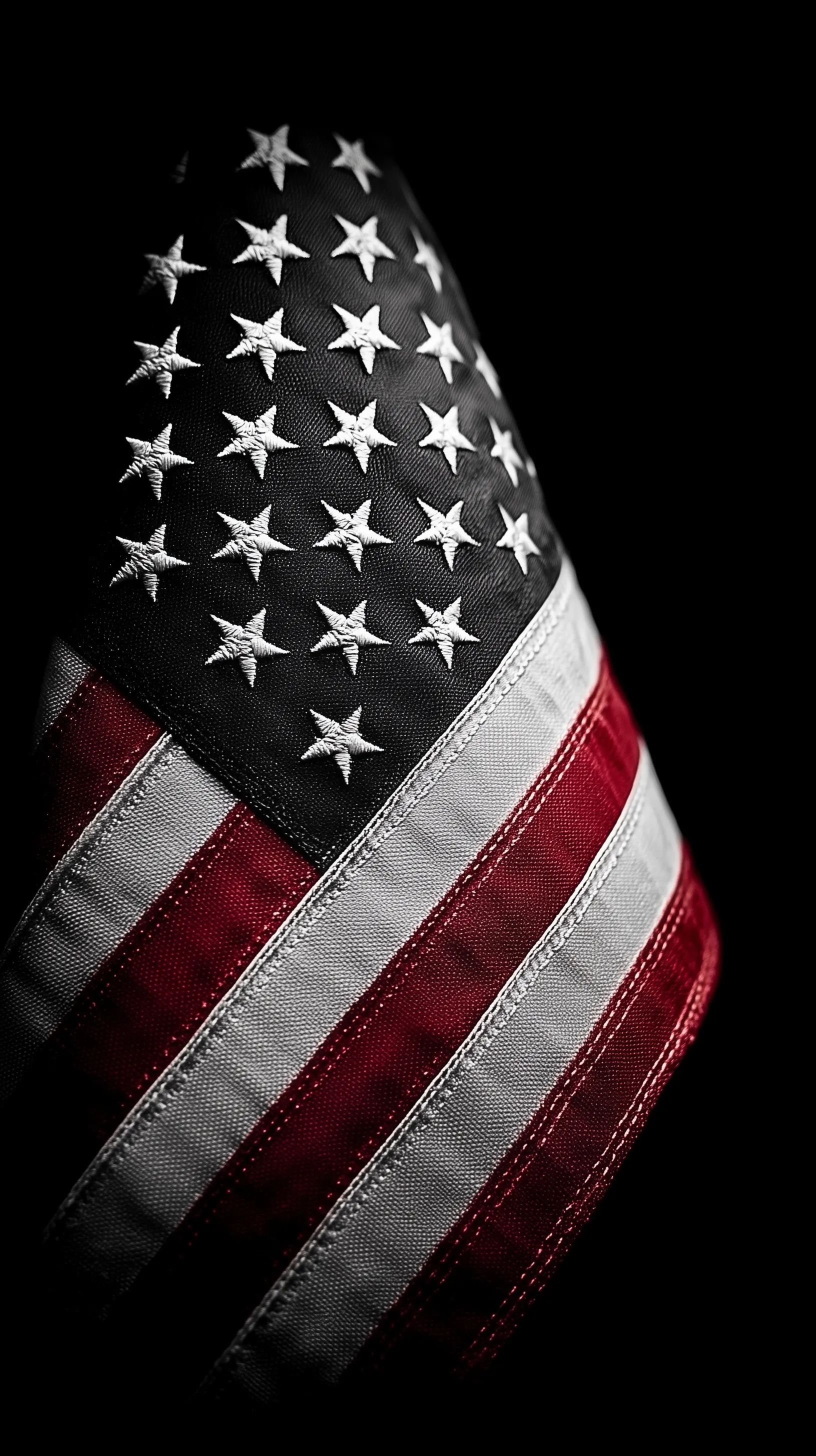 Close-up of an American flag with stars and stripes and clean center negative space, cinematic high-quality HD photo.
